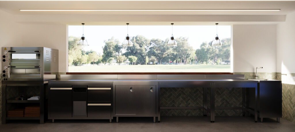 Interior design of a modular shipping container pizza kiosk in Austria, showing pizza oven, stainless-steel workstations, and a large service window to the outside.